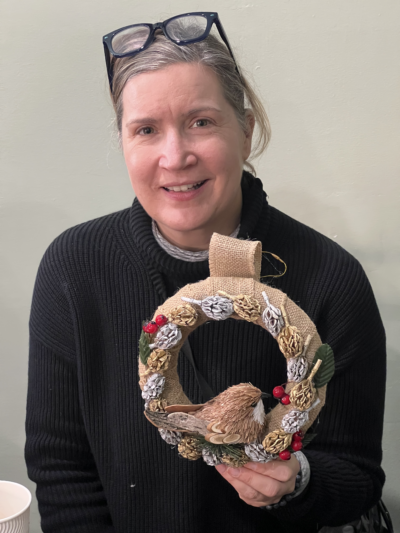 Christine holding her wreath