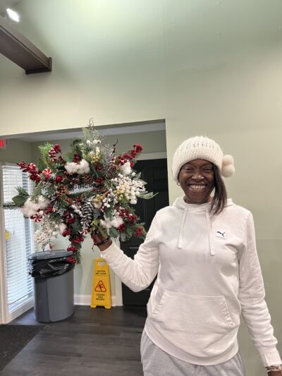 Karen holding her wreath