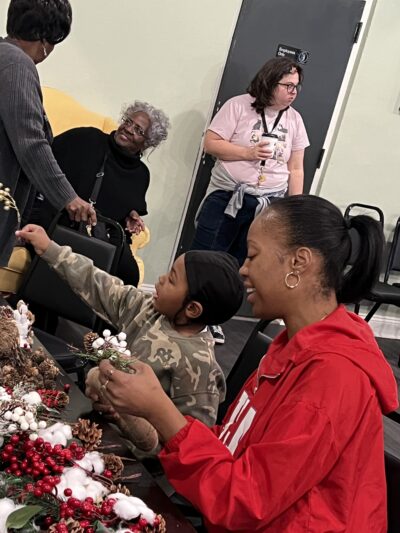 Alicia and Perry making wreaths