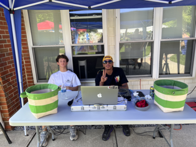 Glenn and the DJ at a table