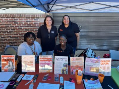 People behind the YWCA information table