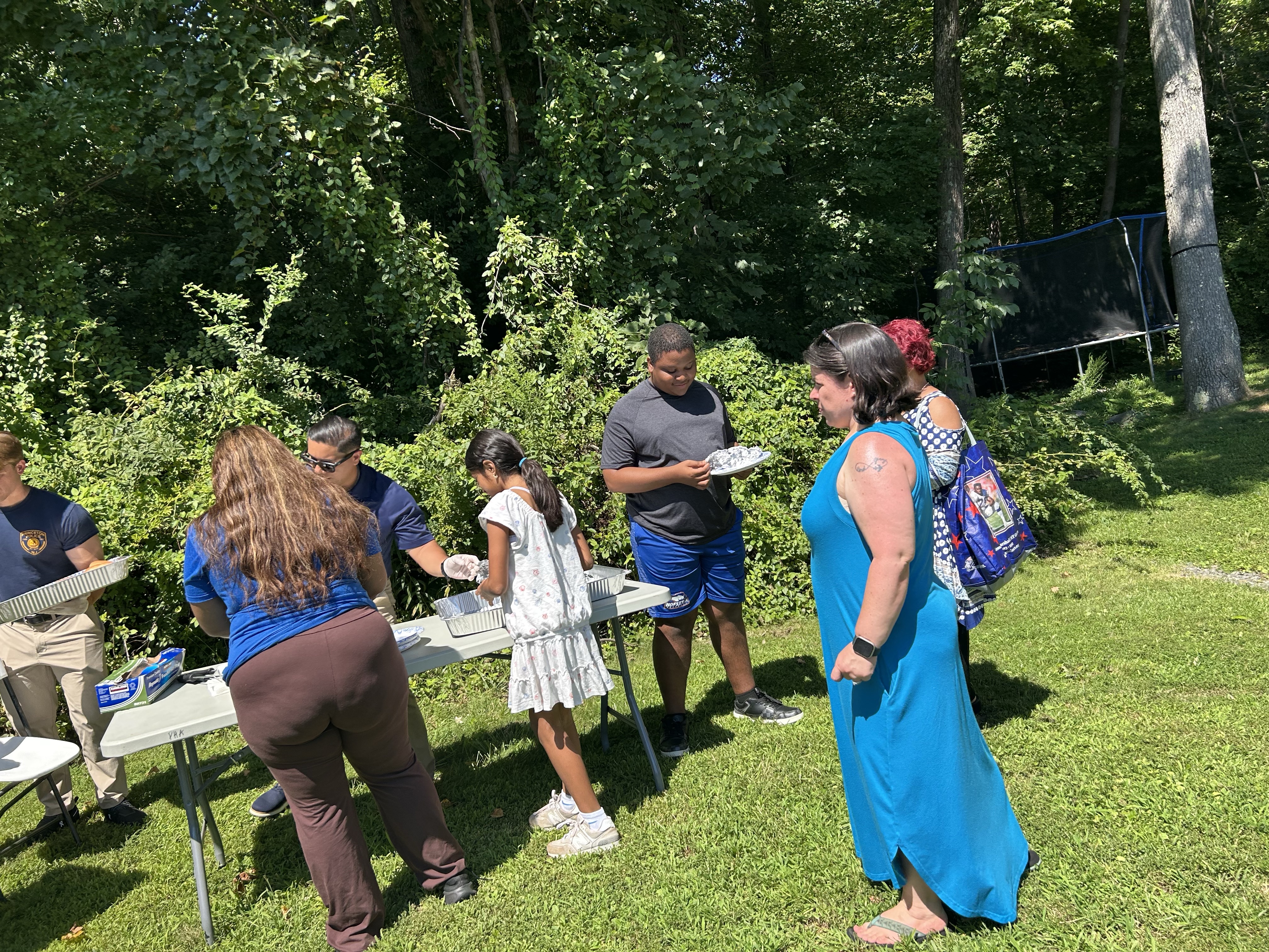 Image of people getting food