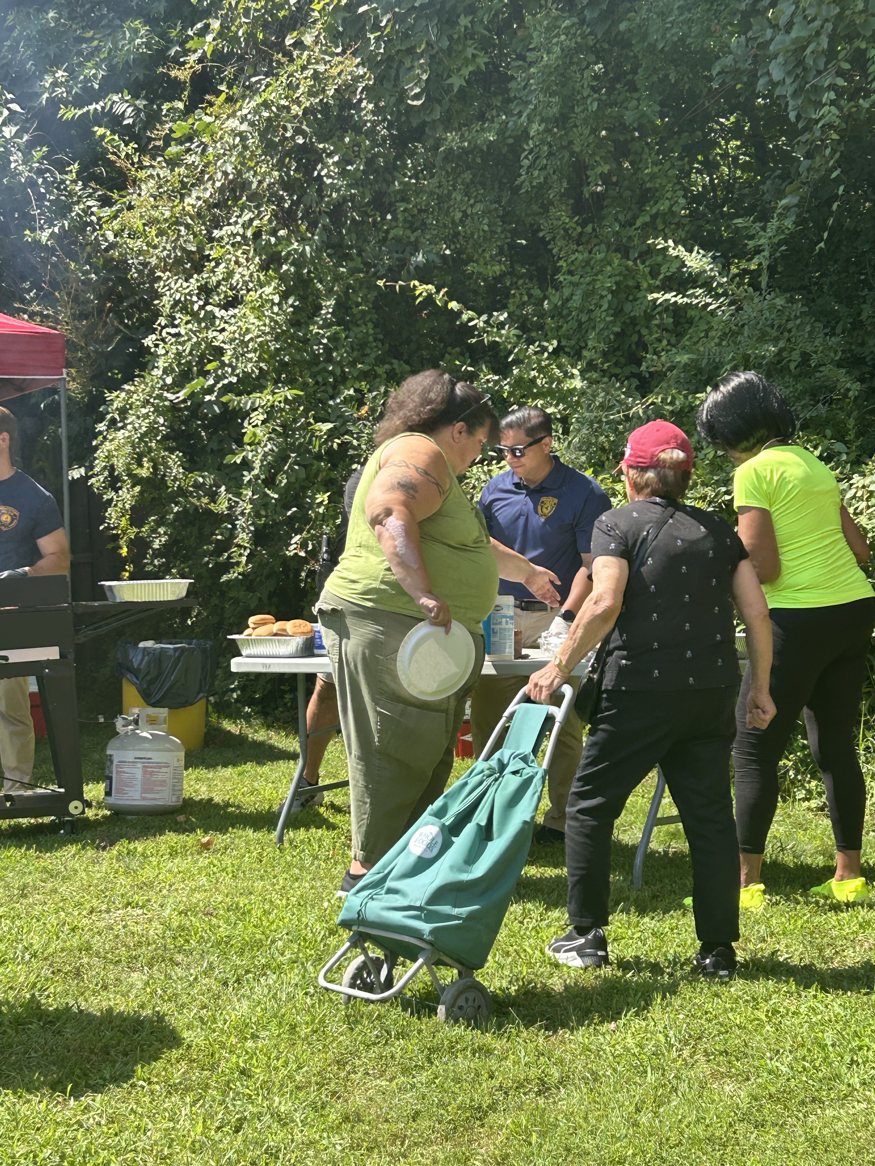 Image of residents getting food