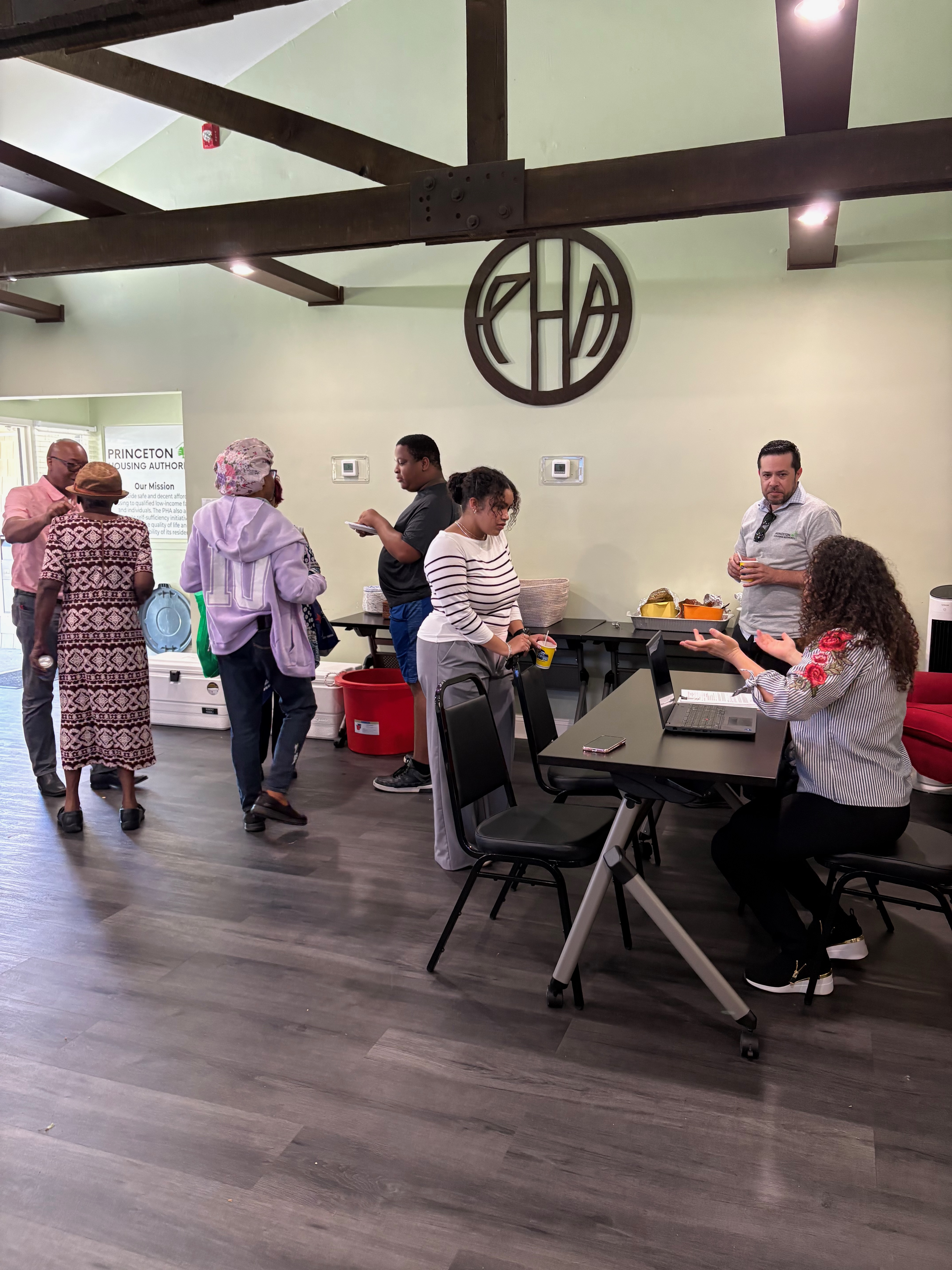 Staff members gathering indoors