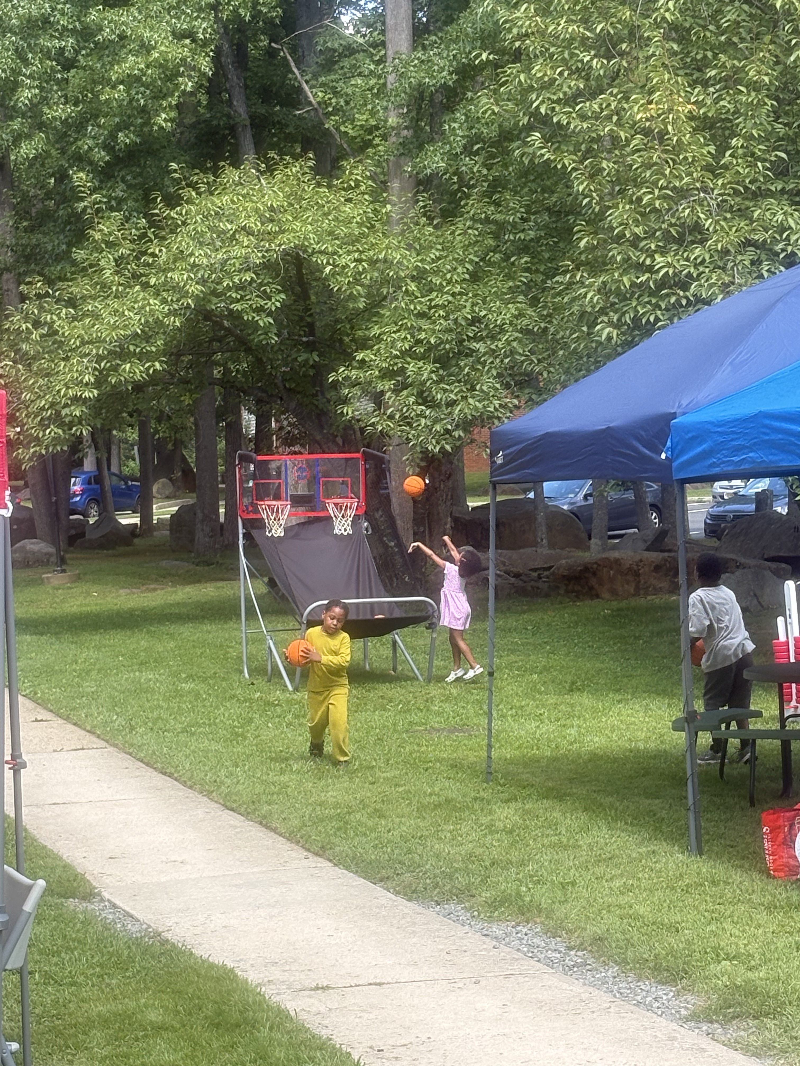 Tenants shooting basketball